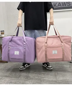 Large capacity waterproof travel storage bag for clothes and quilts, detail view showing dual colors.