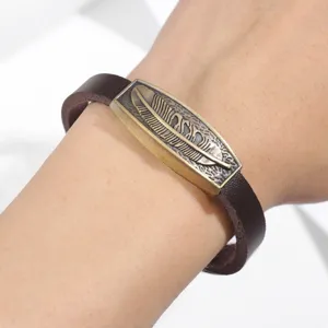 Bracciale in pelle PU marrone piuma vintage retrò da uomo gioiello metallo cool