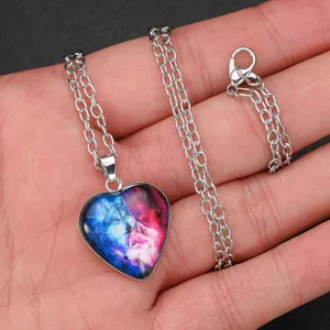 Heart shaped crystal glass pendant necklace with wolf design on silver chain detail