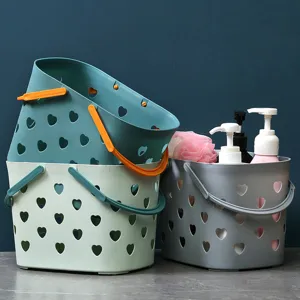 Portable plastic shower basket with hollow design, durable bathroom storage organizer for daily use.