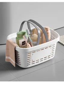 Plastic shower caddy basket with handles, hollow portable bathroom storage organizer for toiletries.