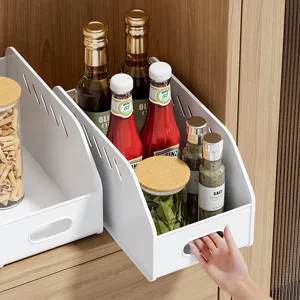 Plastic kitchen cabinet storage box organizer basket for pantry, desktop, and food seasoning.