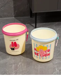 Cute plastic garbage bin detail, vibrant cartoon design with colorful ring and handle.