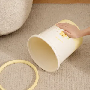 Cute yellow plastic trash can with pressure ring for kitchen, bathroom, and living room use.