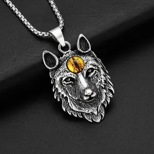 Vintage wolf head pendant necklace with yellow evil eye for men punk style jewelry detail.