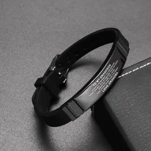 Detailed view of black silicone stainless steel grandson engraved bracelet detail presentation