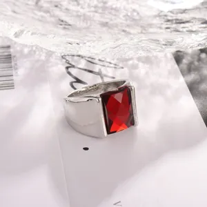 Men's retro alloy ring detailed shot featuring a large rectangular red crystal gemstone.