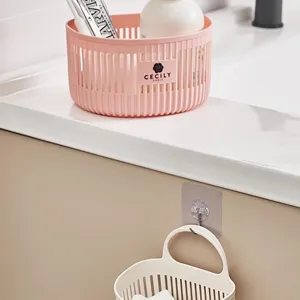 Plastic storage basket and wall mounted hanging organizer for kitchen and bathroom use.