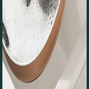 Detailed view of kitchen cleaning brush with soap foam, effective tool for washing dishes and pots.