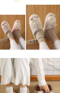 Close-up detail of cute fuzzy sheep slippers, soft plush warm winter footwear home indoor.