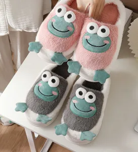 Cute plush frog winter slippers with soft fuzzy texture, warm home indoor non-slip design.