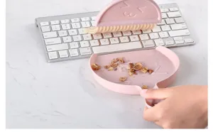Mini desktop broom and dustpan set for keyboard cleaning pink plastic tool detail view