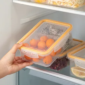 Plastic food storage container with airtight lid and compartments for kitchen fridge.