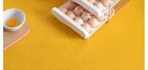 Double layer sliding egg storage box detail, clear plastic kitchen organizer tray.
