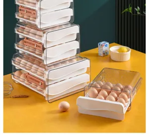 Transparent plastic drawer egg storage box for refrigerator and kitchen organization use.