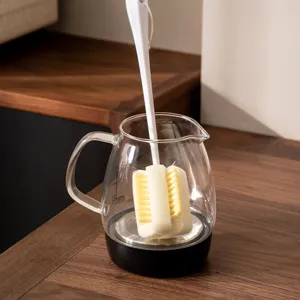 Long handle sponge cup brush designed for cleaning water bottles and glassware efficiently.