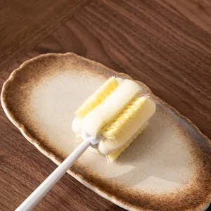 Long handle sponge cup brush for cleaning water bottles, mugs and tea stains effortlessly.