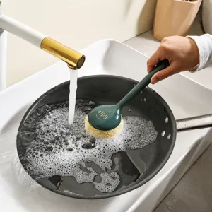 Long handled pot cleaning brush with durable bristles for easy kitchen dishwashing use.