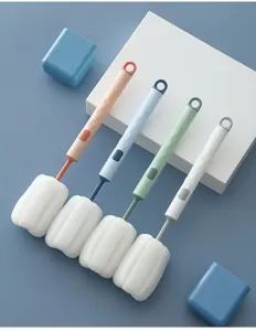 Brosse de nettoyage à long manche avec tête en éponge pour biberons, tasses et verres.