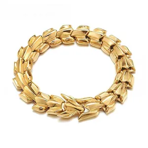 Detailed close-up of retro punk dragon head bracelet, showcasing intricate dragon scale links and metallic golden finish texture.