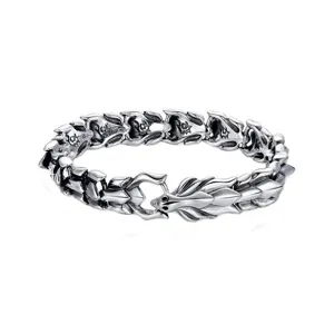 Close-up detail of the retro dragon head punk bracelet, showing exquisite scales and link texture.