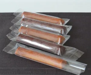 Detail view of individually wrapped long stick pastry packaging bags, clear transparent design.