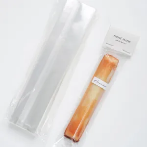 Clear plastic packaging bags for long cigar financier cakes, ideal for baking desserts and treats.