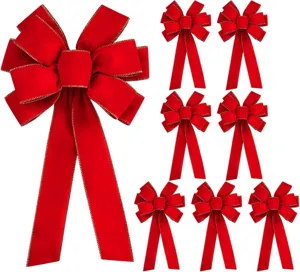 Red velvet Christmas bows close-up view, flocked edge multi-ear hanging decor set.