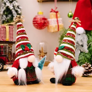 Nordic knitted Christmas gnome doll ornament, festive woolen hat Santa figure for home decor.