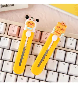 Cute cartoon yellow bear utility knife, portable box cutter for student journal and crafts.