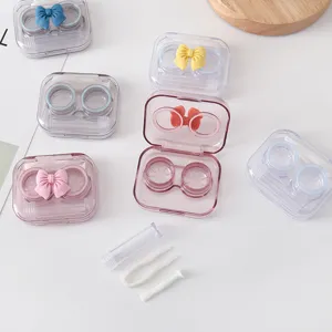 Schattige snoepkleur strik contactlenzen etui draagbare transparante oogverzorgingsset.
