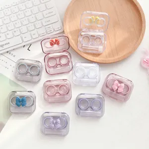 Leuke snoepkleurige strik contactlensdoos draagbaar transparant ontwerp details.