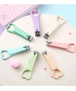 Tagliaunghie a forma di cuore color caramella portatile strumento di manicure in metallo compatto