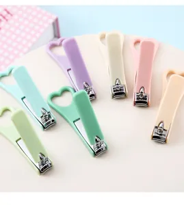 Set tagliaunghie color caramella con manico a cuore, strumento per manicure portatile.