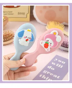 Jolie brosse à cheveux coussin portable de dessin animé mini brosse de massage pour étudiants.