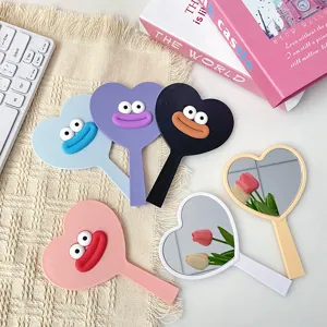 Cute heart-shaped handheld makeup mirror with funny big lips design, portable vanity mirror desk.