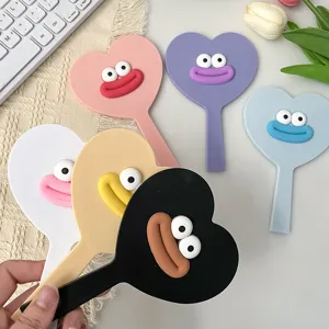 Cute heart shaped hand mirror with funny 3D big lips design, perfect cosmetic makeup detail.