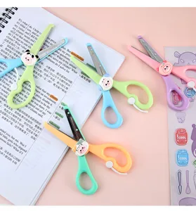 Detailed view of cute cartoon animal children safety scissors with round head for kindergarten.