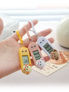 Cute cartoon puppy electronic watch mini portable hanging clock detail view showing cute design.