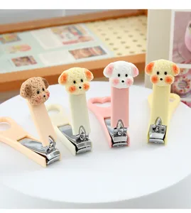 Tagliaunghie carino con cane a cartone animato in acciaio inossidabile con decorazione in resina
