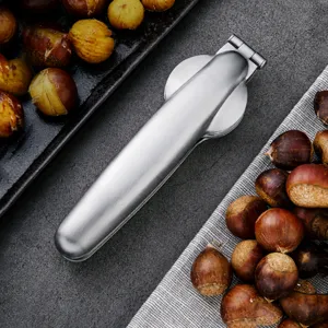 Stainless steel chestnut opener nutcracker tool with cross blade for easy peeling nuts at home.