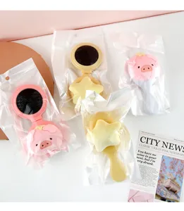 Cute cartoon plush air cushion comb portable folding massage hair brush for daily styling.