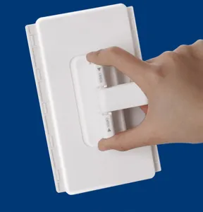 Close-up detail of the white plastic facial towel clip mechanism with easy open design.