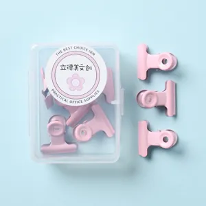 Roze metalen binder clips set doos met opbergdoos voor snacks en voedselafdichting.