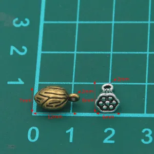 Zinklegierung Pflanze Charme Lotos Samenkapsel Anhänger DIY Schmuck Handwerk Zubehör 2Stk