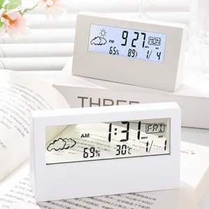 Minimalist white digital alarm clock with LCD screen showing time temperature and humidity for desk.