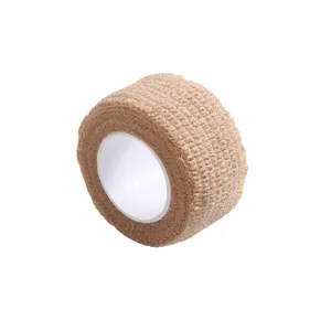 Self-adherent elastic bandage roll for sports finger protection and medical support tape.