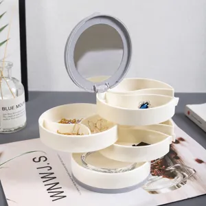 Boîte de rangement à bijoux pivotante multicouche avec miroir intégré pour boucles.