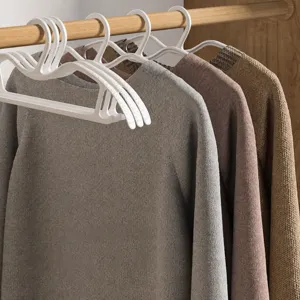 Plastic non-slip clothes hangers with short neck design, anti-bump wardrobe storage.