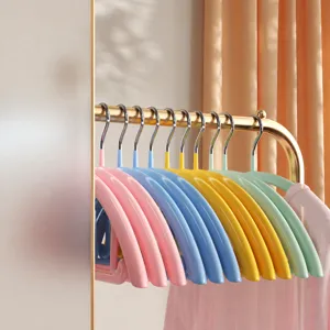 Multi-color non-slip clothes hangers with dipped plastic coating and metal hooks for home.